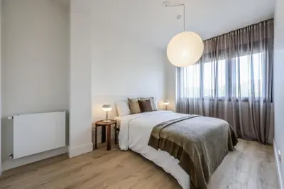 Cama o camas de una habitación en AmazINN Stay Madrid Palacio Real