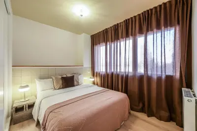 Cama o camas de una habitación en AmazINN Stay Madrid Palacio Real