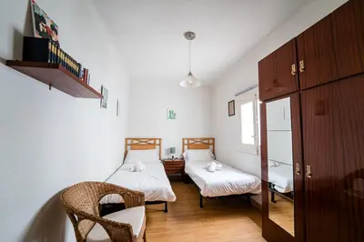 Cama o camas de una habitación en Amplio apartamento en Chamberí by beBalmy