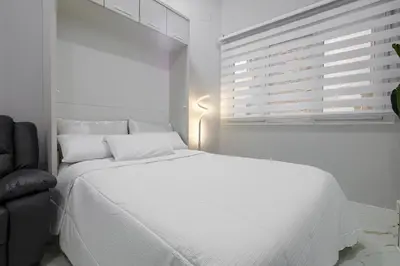 Cama o camas de una habitación en Lovely Apartment in Gran Via Madrid