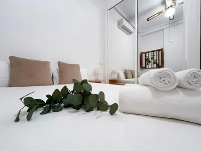 Cama o camas de una habitación en Vibrant Madrid - Apartamento en pleno centro, AC