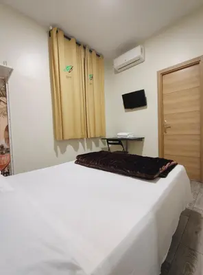 Cama o camas de una habitación en JQC Rooms