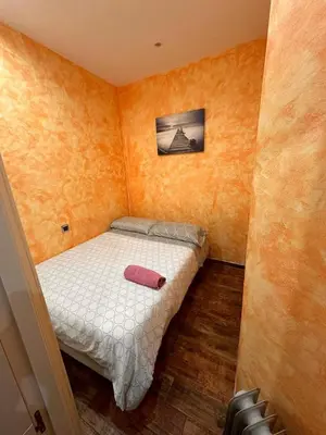 Cama o camas de una habitación en Casa céntrica, en barrio bohemio
