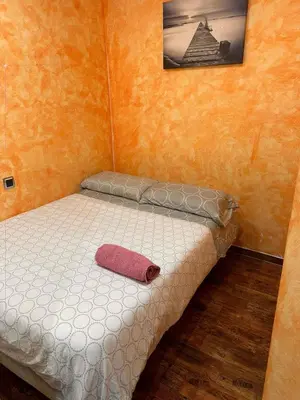 Cama o camas de una habitación en Casa céntrica, en barrio bohemio