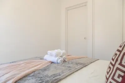 Cama o camas de una habitación en Loft con Terraza Madrid Salitre Temporal