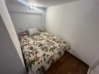 Cama o camas de una habitación en CASTILLA MADRID