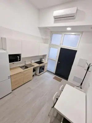 Una cocina o zona de cocina en Seco calle, precisos Loft super equipado cerca de metro Pacífico