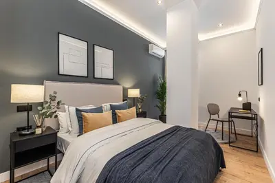 Cama o camas de una habitación en Exyca Embajadores