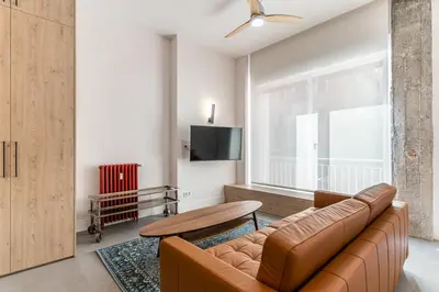 Una televisión o centro de entretenimiento en VR Palace Apartments