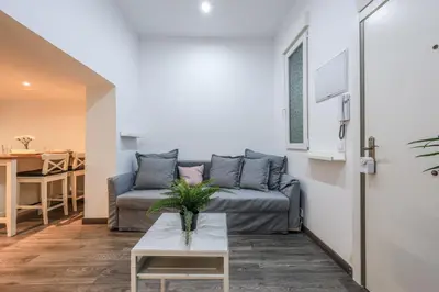 Zona de estar de Discover Madrid from our cozy studio