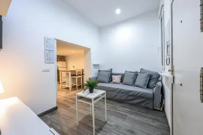 Zona de estar de Discover Madrid from our cozy studio