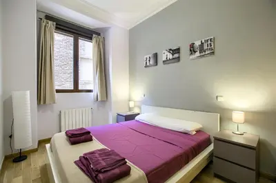 Cama o camas de una habitación en Apartamento en centro histórico