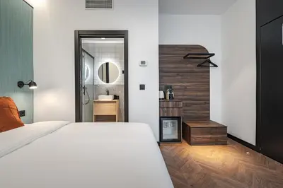 Cama o camas de una habitación en Style Suites by Olala Homes