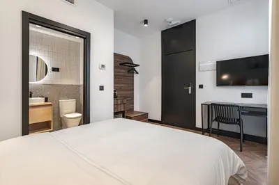 Cama o camas de una habitación en Style Suites by Olala Homes