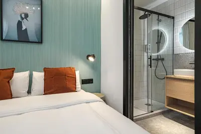 Cama o camas de una habitación en Style Suites by Olala Homes