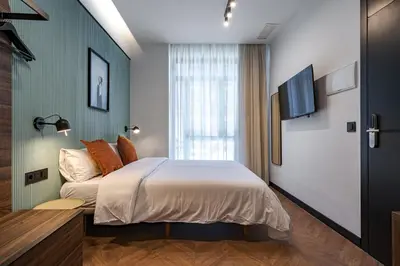 Cama o camas de una habitación en Style Suites by Olala Homes