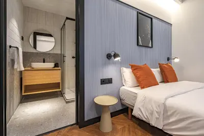 Cama o camas de una habitación en Style Suites by Olala Homes