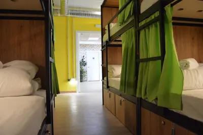 Cama o camas de una habitación en Debod Hostel