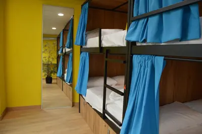 Cama o camas de una habitación en Debod Hostel
