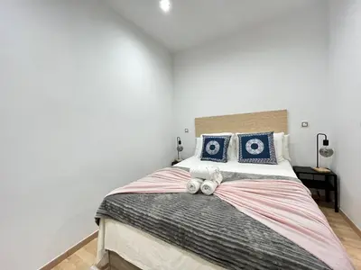 Cama o camas de una habitación en Centro Embajadores Ave