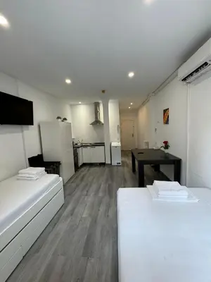 Cama o camas de una habitación en Estudio en Callao, 4 personas