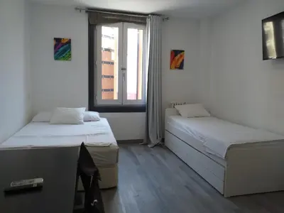 Cama o camas de una habitación en Estudio en Callao, 4 personas
