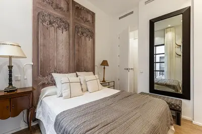 Cama o camas de una habitación en Waou Gran Via VI - Alquiler Corta Duración