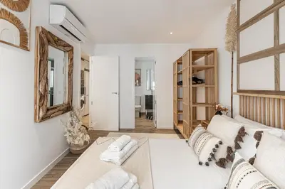 Cama o camas de una habitación en Waou Plaza de Oriente es MIA - Corta Duración