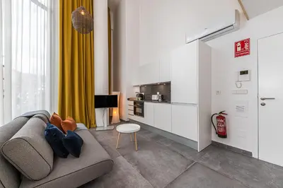 Una televisión o centro de entretenimiento en Waou Modern Loft I Centre