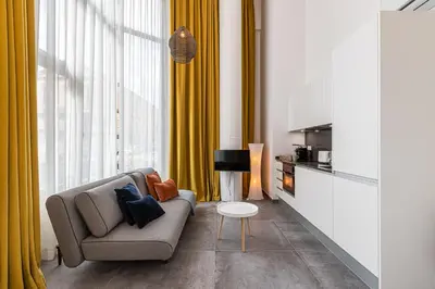 Una televisión o centro de entretenimiento en Waou Modern Loft I Centre