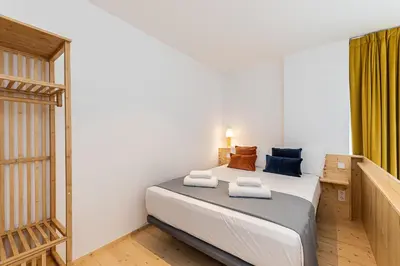 Cama o camas de una habitación en Waou Modern Loft II Centre