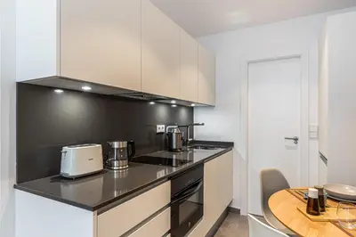 Una cocina o zona de cocina en Waou Modern Loft III Centre