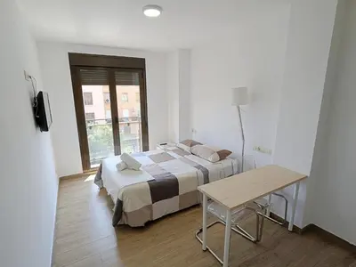 Cama o camas de una habitación en TravelStep General Ricardos