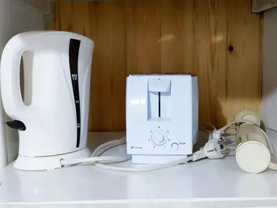 Utensilios para hacer té y café en Apartamento independiente en el corazón de la ciudad