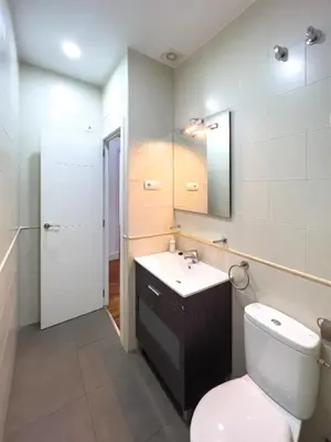 Un baño de Callao Suites