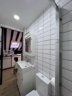 Un baño de Callao Suites