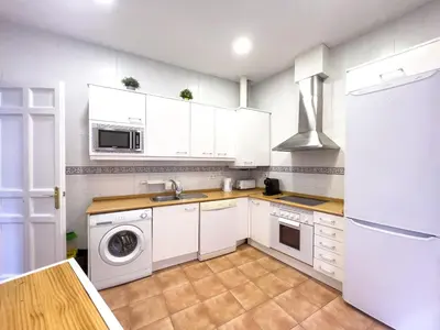 Una cocina o zona de cocina en Callao Suites