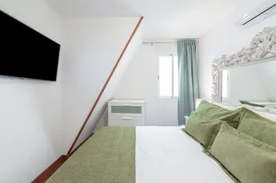 Cama o camas de una habitación en Duplex PLAZA MAYOR by MONARO*****