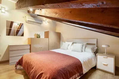 Cama o camas de una habitación en Victor Apartments Plaza España