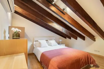 Cama o camas de una habitación en Victor Apartments Plaza España