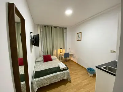 Cama o camas de una habitación en TravelStep Malasaña