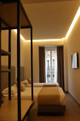 Cama o camas de una habitación en Hostal La Rúa-Montera