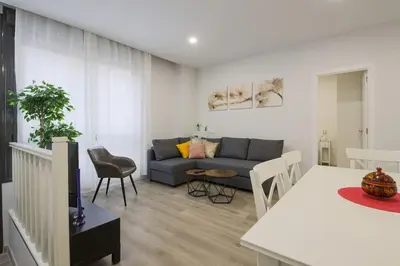 Zona de estar de Amplio apto 2 hab a 20min de Puerta del Sol