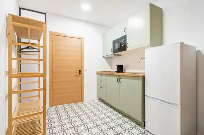 Una cocina o zona de cocina en Nice flat in Lavapiés at street level S23C