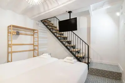 Cama o camas de una habitación en Nice flat in Lavapiés at street level S23C