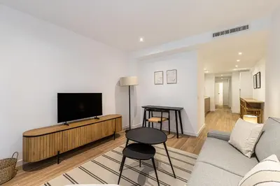 Una televisión o centro de entretenimiento en Waou Best I Madrid Rio