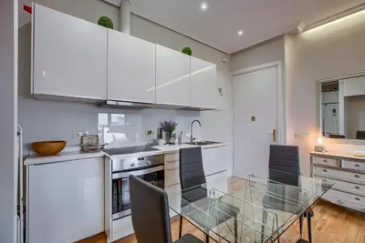 Una cocina o zona de cocina en Apartamento En El Centro Con Vistas Impresionantes