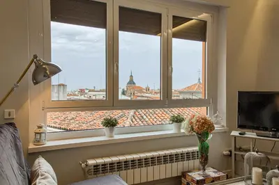Una televisión o centro de entretenimiento en Apartamento En El Centro Con Vistas Impresionantes