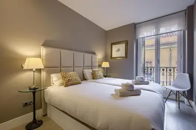 Cama o camas de una habitación en Madrid Catedral - 1 dormitorio en el Centro