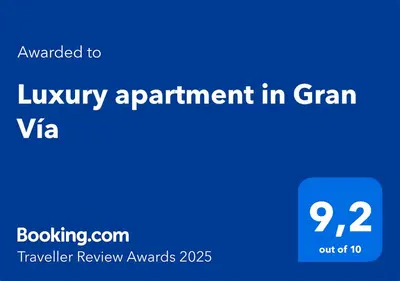 Certificado, premio, señal o documento que está expuesto en Luxury apartment in Gran Vía